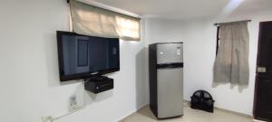 Μια τηλεόραση ή/και κέντρο ψυχαγωγίας στο Loft Silencioso San Alonso