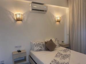 Postel nebo postele na pokoji v ubytování Apartamentos Magallanes Bayahibe