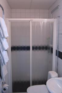 Ett badrum på Hotell Leksand
