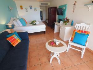 Posezení v ubytování TI OASIS Trinidad, Studio vue Mer à Pierre & Vacances