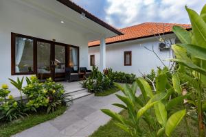 Zahrada ubytování Nusa Indah Onai Hotel