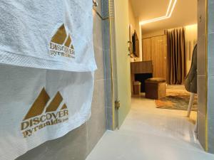 Postel nebo postele na pokoji v ubytování Discover pyramids inn