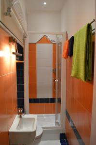 a bathroom with a shower and a toilet and a sink at Casa Vacanze All'angolo in Trieste +34 photos