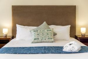 Postelja oz. postelje v sobi nastanitve Sanctuary Resort Motor Inn