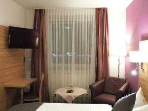 TV a/nebo společenská místnost v ubytování Hotel Prinz Heinrich