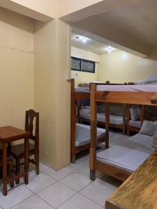 Postel nebo postele na pokoji v ubytování Querencia Inn