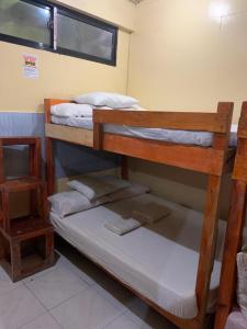 Postel nebo postele na pokoji v ubytování Querencia Inn