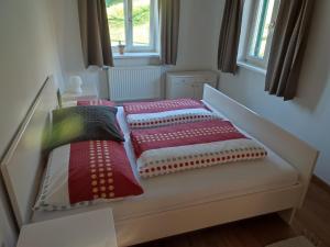 Postel nebo postele na pokoji v ubytování Ferienhaus Temmel