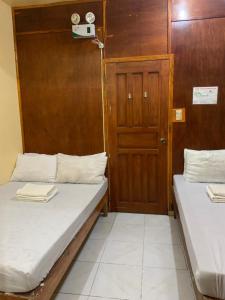 Postel nebo postele na pokoji v ubytování Querencia Inn