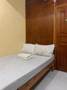 Postel nebo postele na pokoji v ubytování Querencia Inn