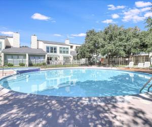 a large swimming pool in front of a house at Tranquil Bay RRYC50 in Rockport