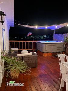 Een balkon of terras bij Palmeras Beach Apartments - Playa Santa