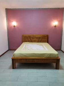 Säng eller sängar i ett rum på Villa Turquoise