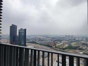 a view of a city from the balcony of a building at I-City & I-Soho, Shah Alam I-City Mall Walking Distance, Luxury Room in Shah Alam