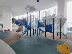 a playground in a building with a slide at I-City & I-Soho, Shah Alam I-City Mall Walking Distance, Luxury Room in Shah Alam