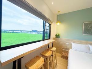 Postel nebo postele na pokoji v ubytování 好室一庒House in field宜蘭獨棟平房民宿 可包棟