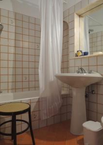 Ett badrum på La Tavolozza Residence