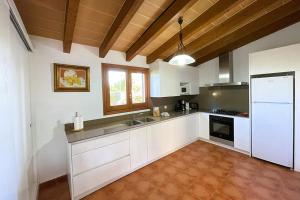 Una cocina o zona de cocina en Villa Cal Roma