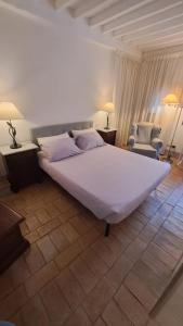 Een bed of bedden in een kamer bij Casa vacanze Iris
