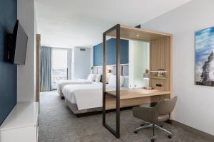 Postel nebo postele na pokoji v ubytování SpringHill Suites St. Paul Downtown + 21 fotografií