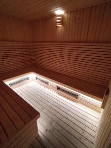 a sauna with a light on the inside of it at Double Nine Homestay - Sri Indah Condominium in Sandakan