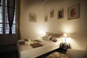 Postel nebo postele na pokoji v ubytování Nik rooms