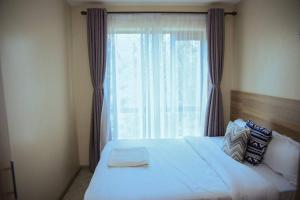 מיטה או מיטות בחדר ב-65chTv + Fast Wifi + Nature View