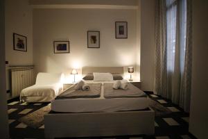 Postel nebo postele na pokoji v ubytování Nik rooms