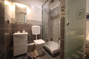Koupelna v ubytování Nik rooms