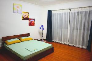 Postel nebo postele na pokoji v ubytování Le Mavam appartement meublé E