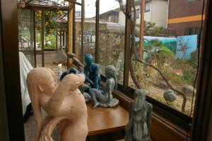 a group of statues sitting on a window sill at Kōnotori no sato no yado - Vacation STAY 11102 in Kōnosu