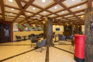 TV a/nebo společenská místnost v ubytování Zaman Homeland Hotel