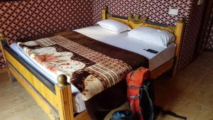 Postel nebo postele na pokoji v ubytování Star Camp Wadi Rum