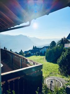 a view from the balcony of a house with a view at Casa Lilly - CharmingStay in Flumserberg