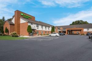 a rendering of a hotel with a parking lot at Wyndham Garden Galena Hotel & Day Spa in Galena