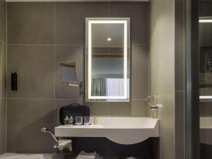 Um banheiro em Novotel Genève Centre