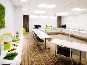 Área de negócios e/ou sala de conferências em Novotel Genève Centre