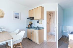 Kuchyň nebo kuchyňský kout v ubytování Haus Seeblick Wohnung 12 Easy Ocean