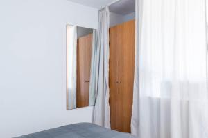 Postel nebo postele na pokoji v ubytování Haus Seeblick Wohnung 12 Easy Ocean