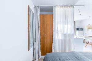 Postel nebo postele na pokoji v ubytování Haus Seeblick Wohnung 12 Easy Ocean