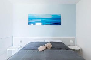 Postel nebo postele na pokoji v ubytování Haus Seeblick Wohnung 12 Easy Ocean