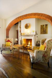 Posezení v ubytování Villa Vignacce - Boutique Country Resort + 37 fotografií
