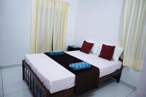 Guestland Homestay客房内的一张或多张床位