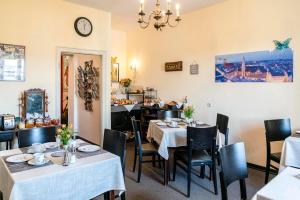 Restaurace v ubytování Hotel-Pension am Siegestor