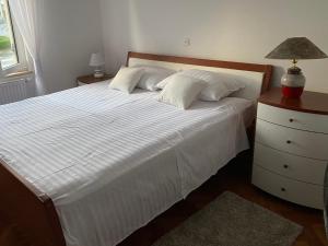 Posteľ alebo postele v izbe v ubytovaní Apartment Tina