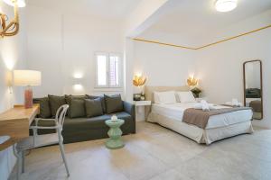 Postel nebo postele na pokoji v ubytování 23 Hotel Mykonos