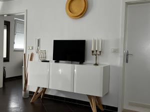 TV a/nebo společenská místnost v ubytování Kavajin Rooms