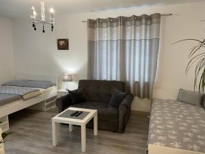 Posteľ alebo postele v izbe v ubytovaní NONIEWICZA CENTRUM