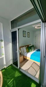 Ein Bett oder Betten in einem Zimmer der Unterkunft Ocean View Penthouse
