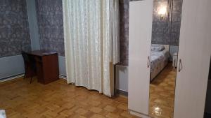 Postel nebo postele na pokoji v ubytování Royal Boutique Hotel on Kievyan